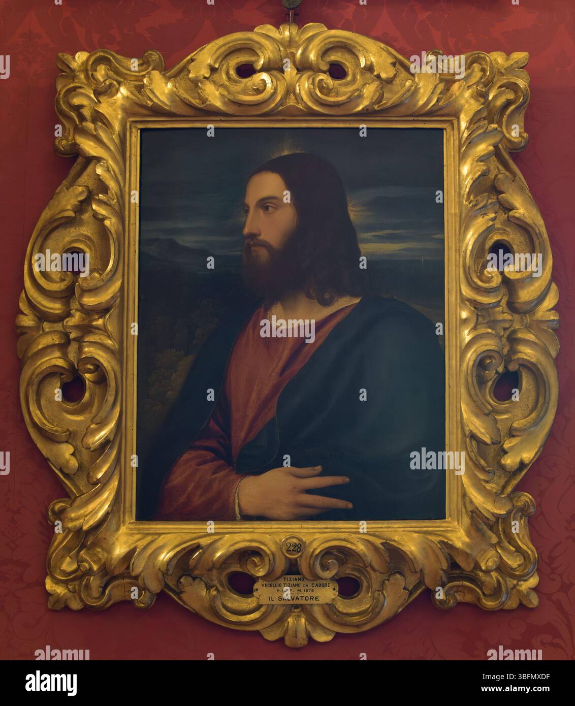 Titian, Christ the Redeemer (Il Salvatore), half-length portrait of Jesus with raised hand and dark robe, early 16th century, Palazzo Pitti, Florence, Stock Photo