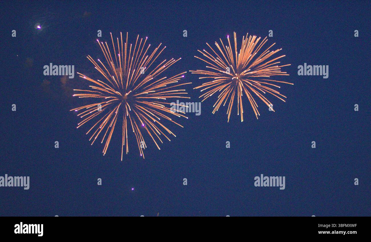 Fireworks in night sky Stock Photo