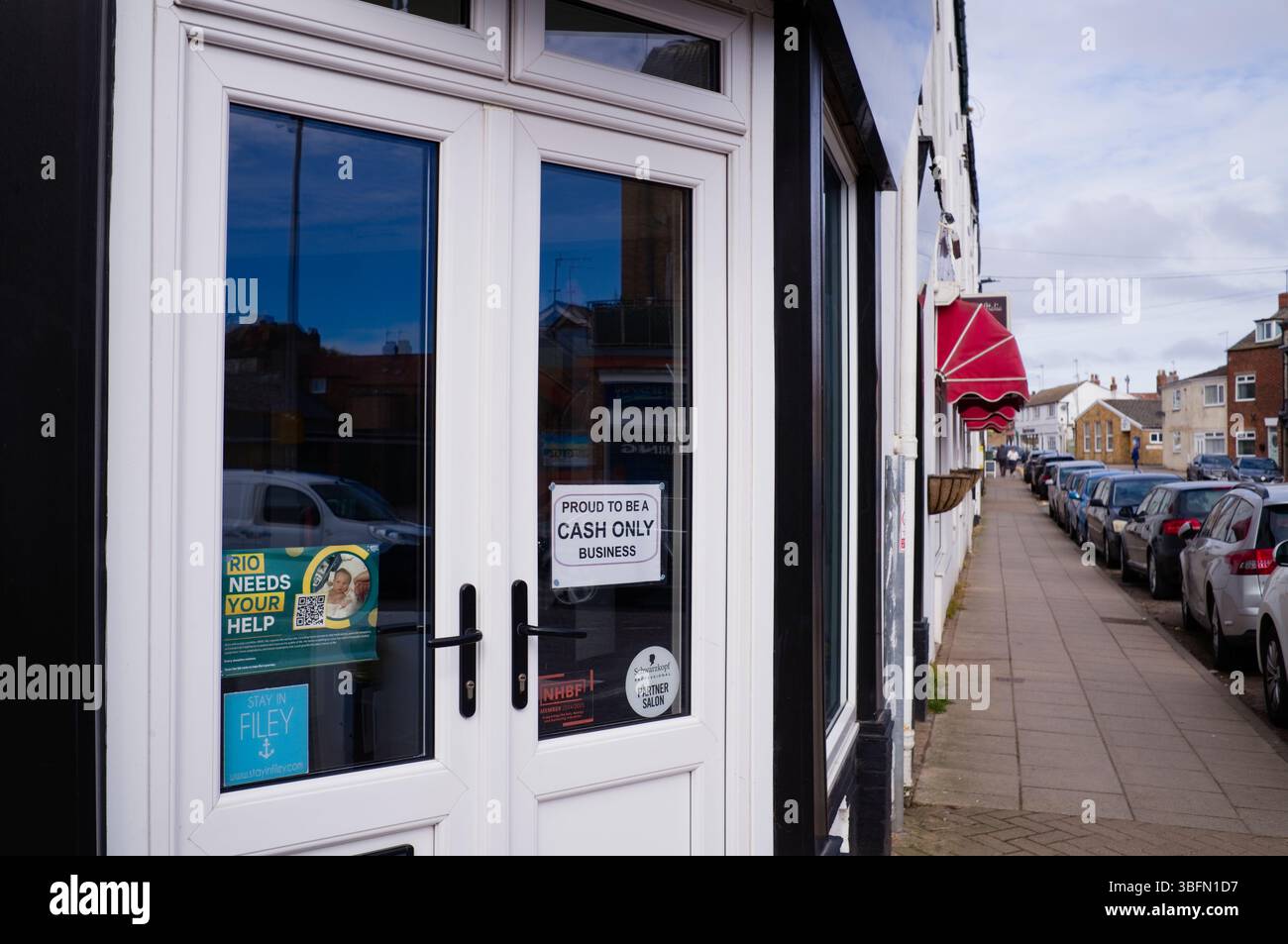 In Filey many businesses prefer to be cash only Stock Photo