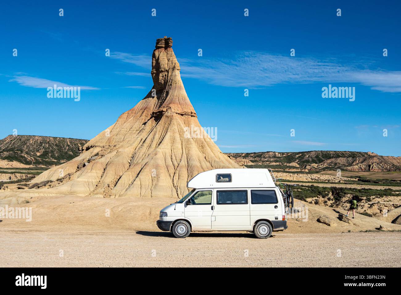 Camper van in front of Castildetierra rock formation, semi-desert, Bardena Blanca area, Bardenas Reales Natural Park, Navarre, Spain, Europe Stock Photo