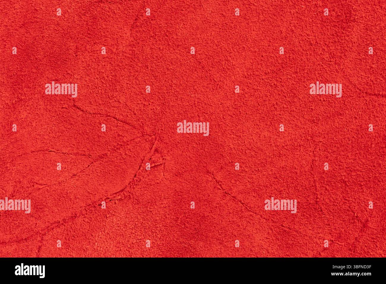 Red leather background or texture. Closeup of red leather texture Stock Photo