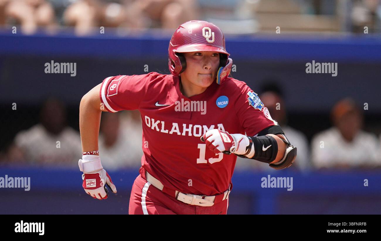 Oklahoma catcher Isabela Emerling (13) runs to first during an NCAA
