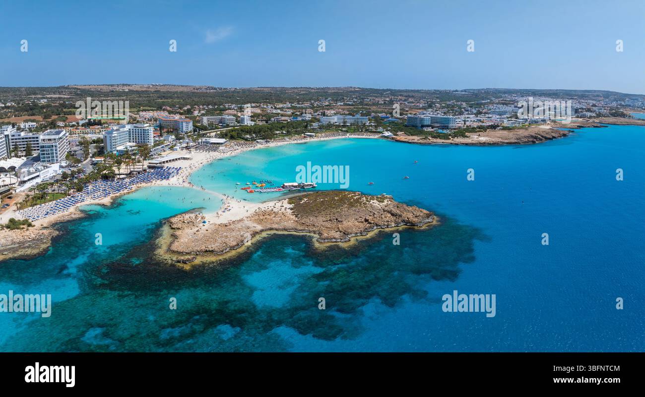 Aerial View Of Nissi Beach And Resorts In Ayia Napa Cyprus Stock Photo aerial-view-of-nissi-beach-and-resorts-in-ayia-napa-cyprus-stock-photo