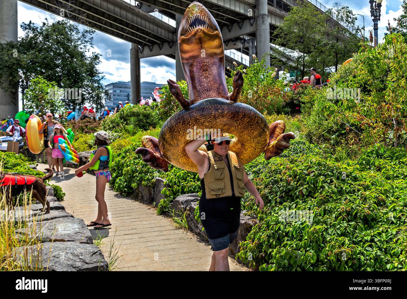 The Big Float, Portland, Oregon - July 13th 2019: A participant carries ...
