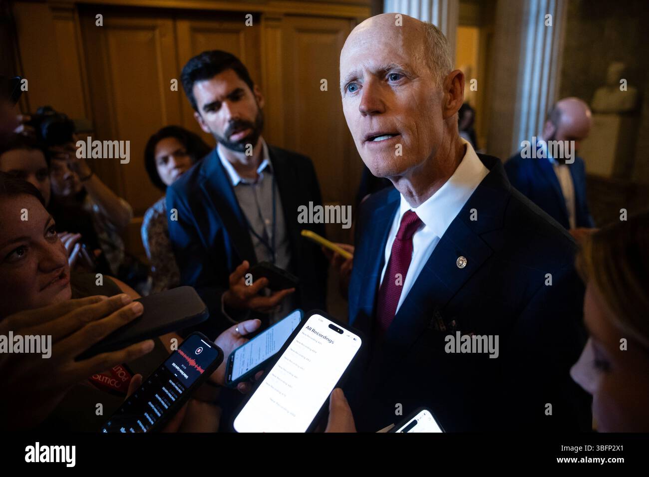 Sen. Rick Scott (R-Fla.) speaks with reporters at the U.S. Capitol June ...