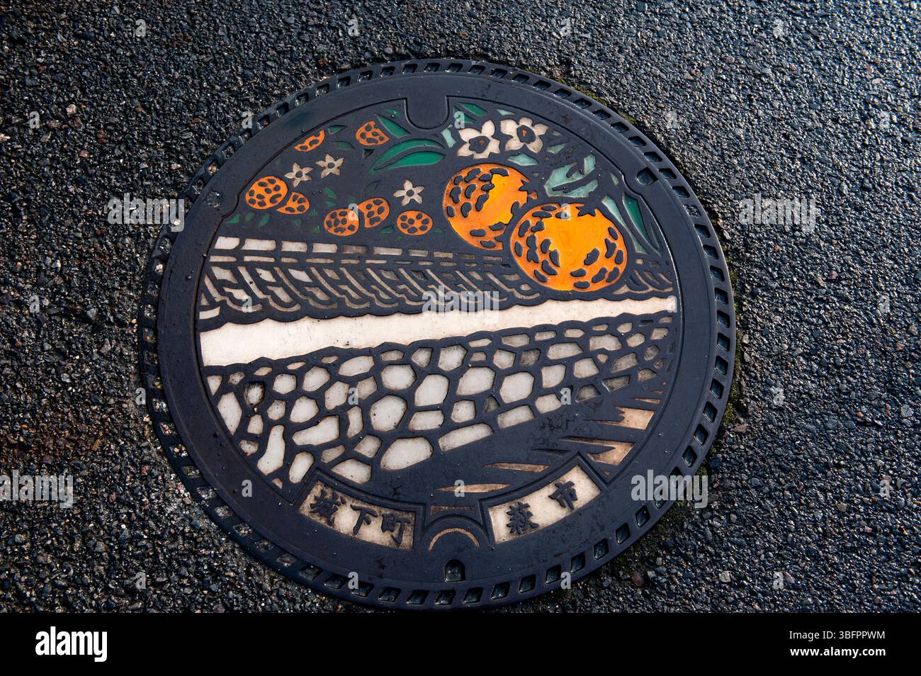 Artistic Japanese manhole cover from Hagi, Yamaguchi depicting the