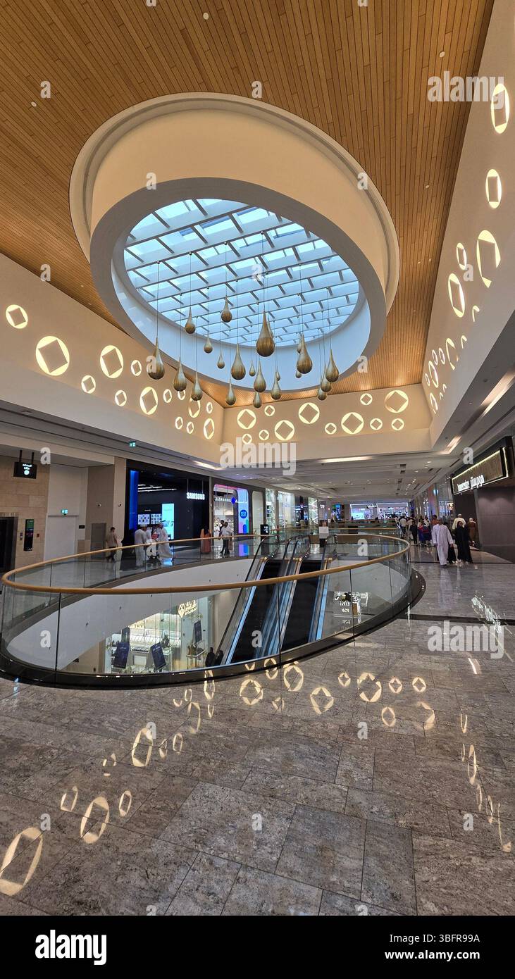 Impressive architectural design of the interior of Mall of Oman, Muscat, Oman - Smartphone Captured Stock Image