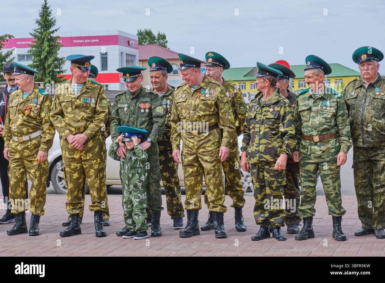 Former border guards lined up in row on Border Guards Day. Among them ...