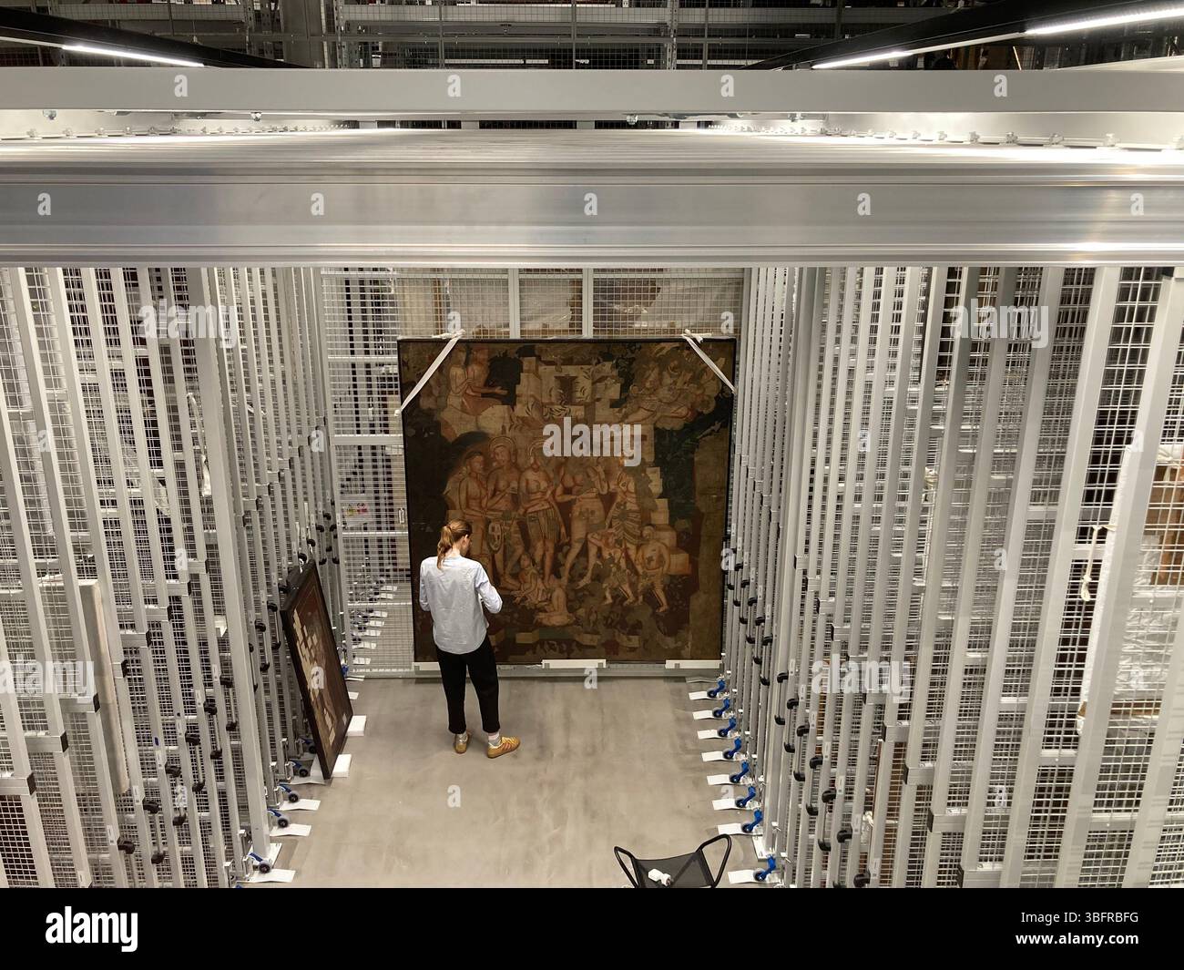 Viewing galleries allow visitors to see behind the scenes at the V&A East Storehouse, Queen Elizabeth Olympic Park, London, UK - Smartphone Captured Stock Image
