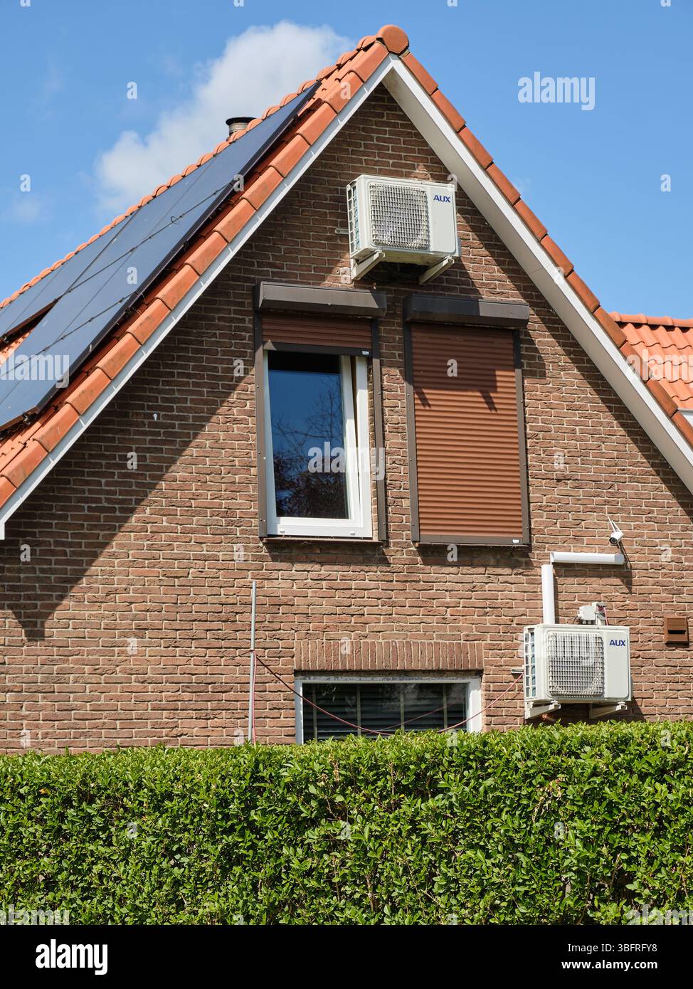 May 22, 2025 - Oosterland-Netherlands: Traditional Dutch brick house