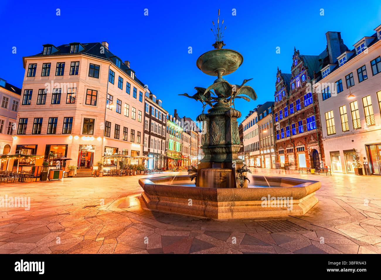 Copenhagen, Denmark: Stork Fountain in Stroget shopping district on Amagertorv, Amager Square,  the longest pedestrian street in the world, Europe Stock Photo