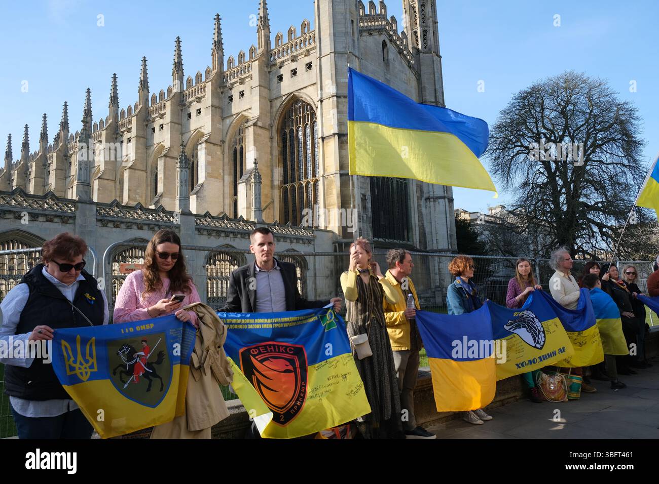 Ukrainians protest against the Russian invasion of their country outside King's College Chapel in Cambridge Stock Photo