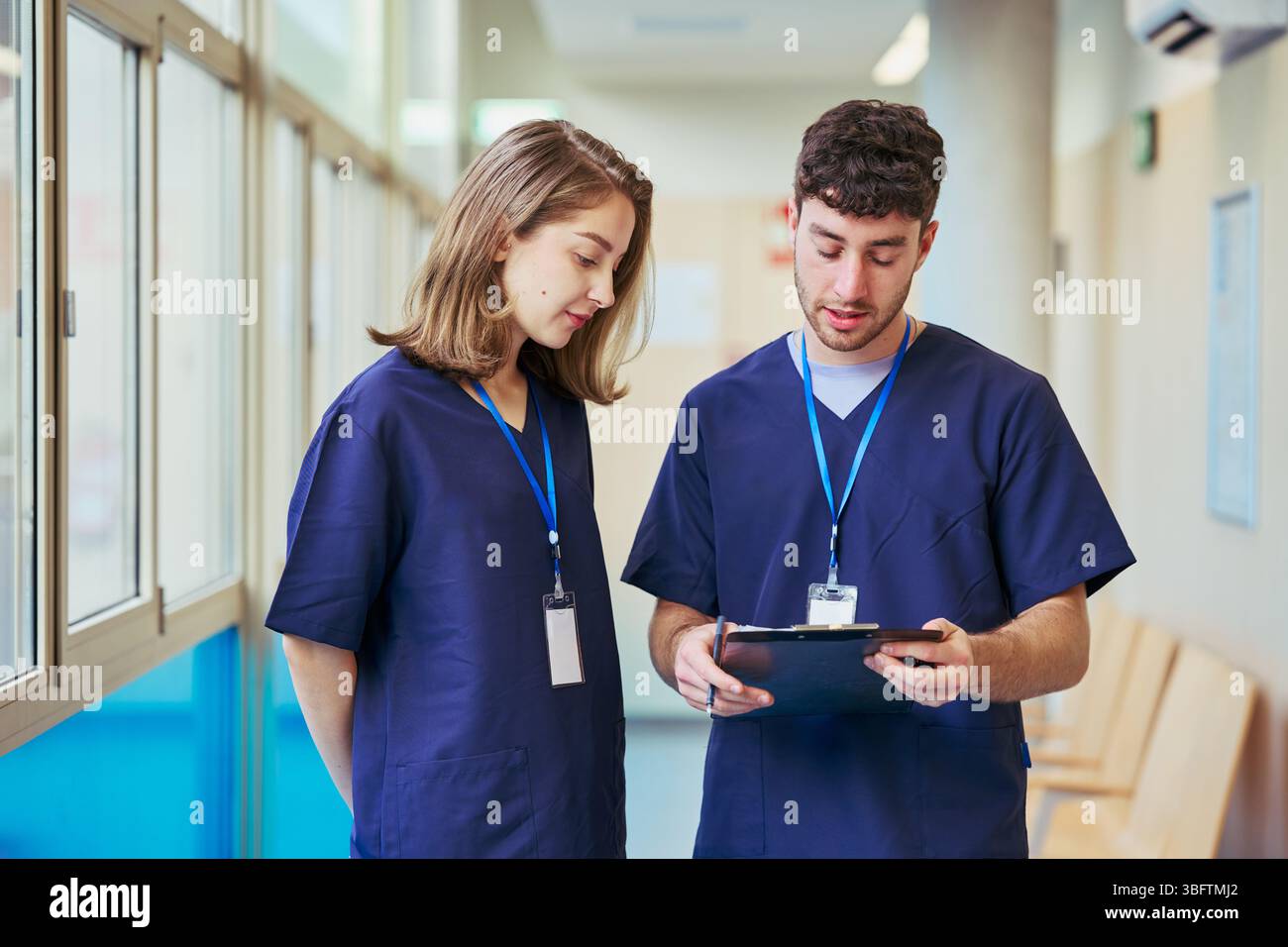 Medical professionals collaborating: analyzing patient records in ...