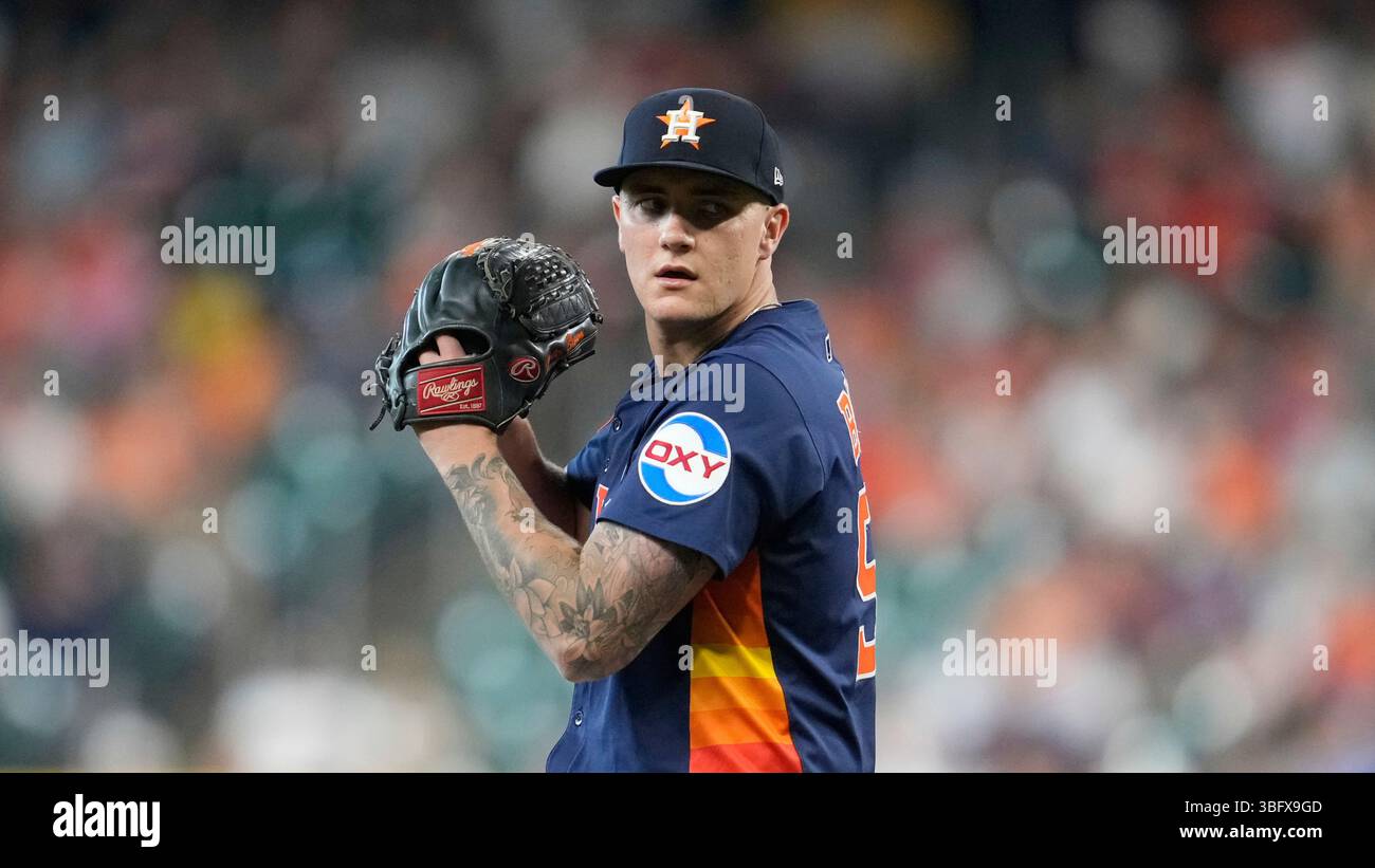 Houston Astros starting pitcher Hunter Brown throws during a baseball ...