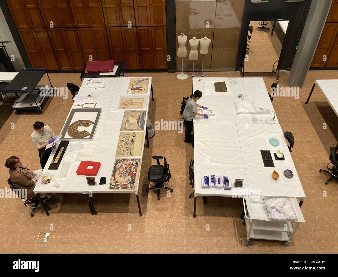 Viewing galleries allow visitors to see behind the scenes at the V&A East Storehouse, Queen Elizabeth Olympic Park, London, UK - Smartphone Captured Stock Image