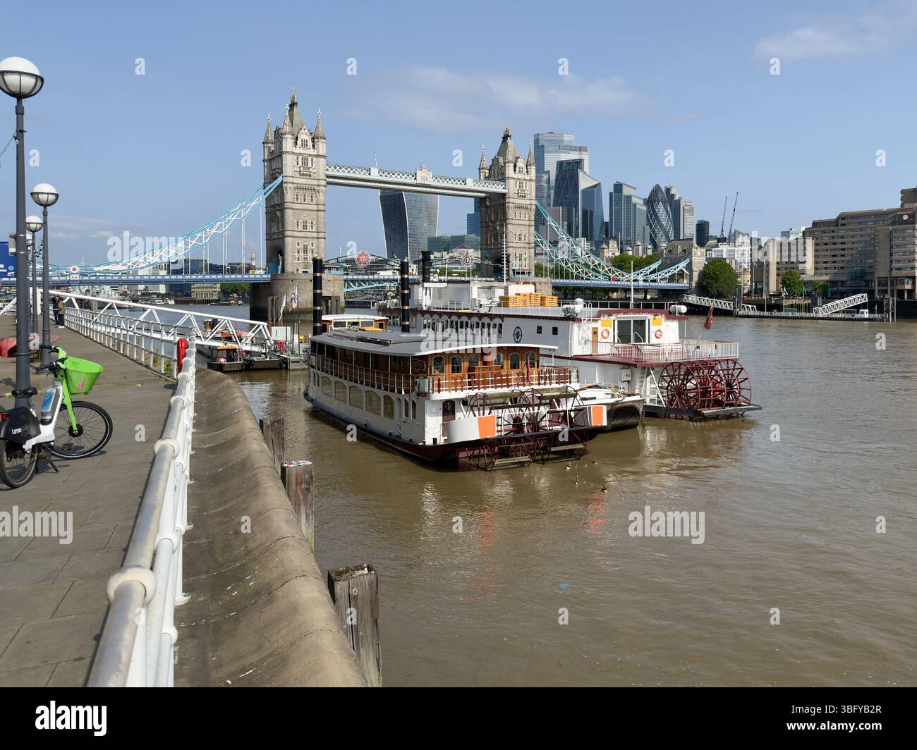 LONDON, UNITED KINGDOM – OCTOBER 5, 2023: A paddle steamer is docked on the River Thames with Tower Bridge in the background. - Smartphone Captured Stock Image
