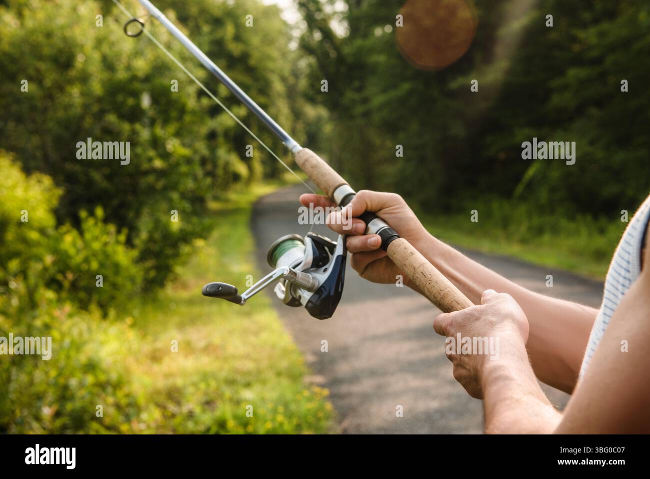 Hand fishing reel hi-res stock photography and images - Alamy