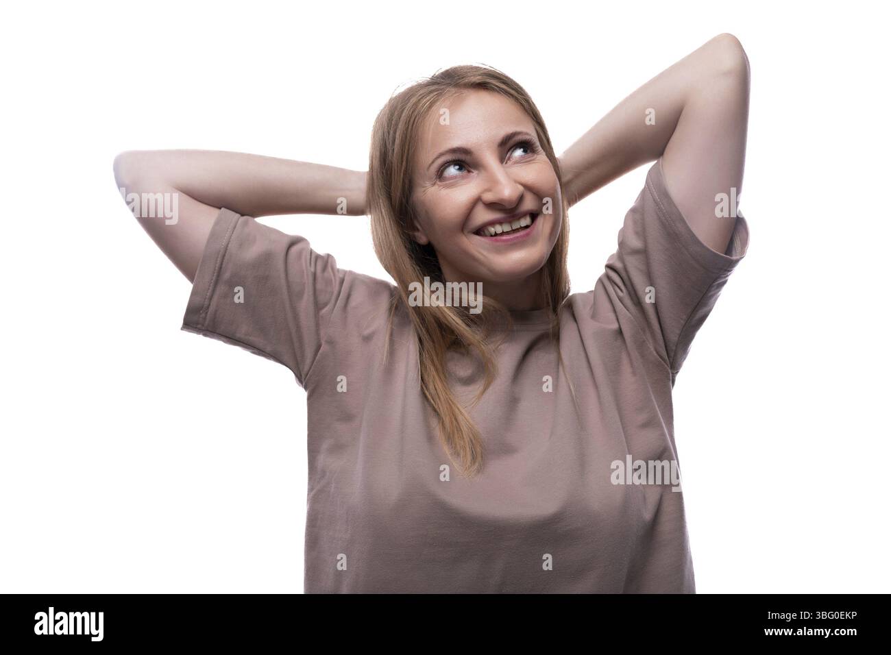 Woman thinking against plain hi-res stock photography and images - Alamy