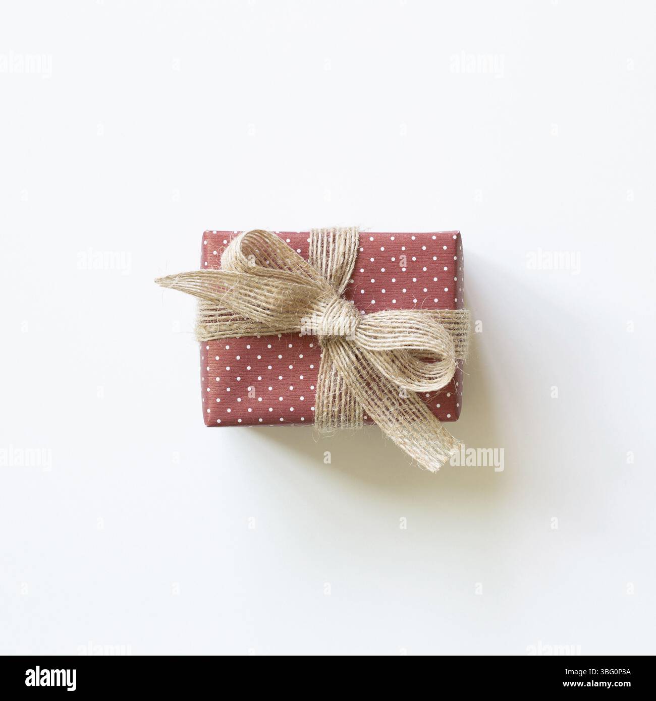 Dot pattern red gift box isolated on white background. top view, copy space Stock Photo