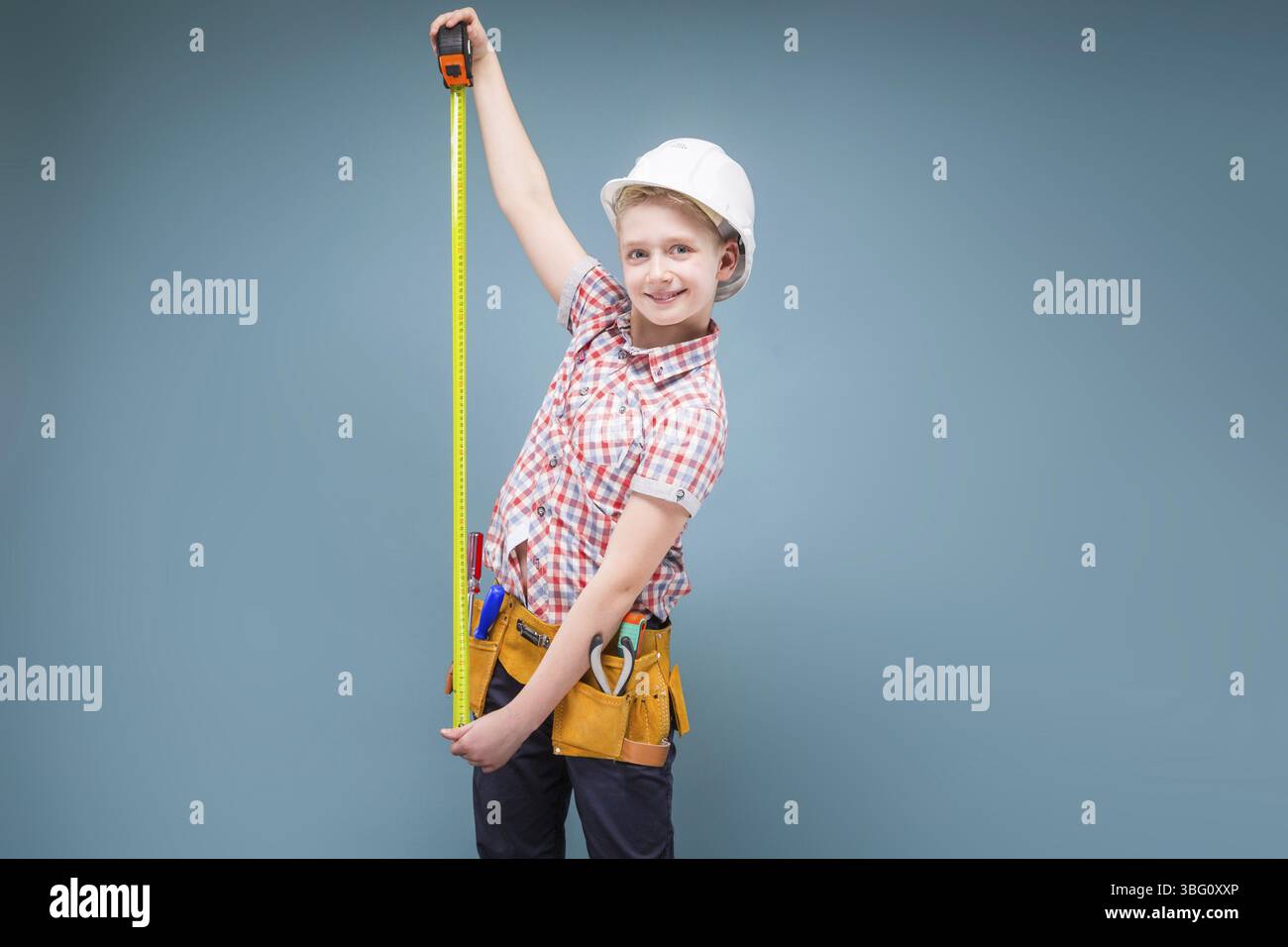 Confident Ruler Studio picture of a young confident teenager in helmet and protective ...