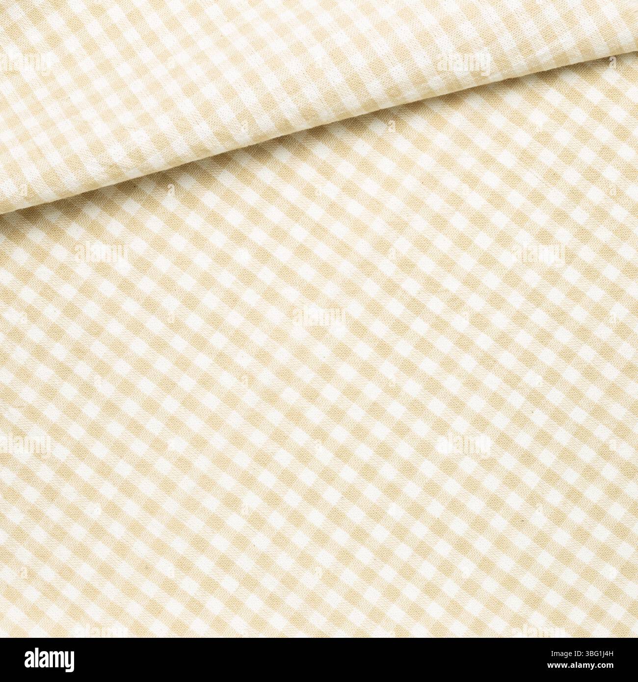 Crumpled beige check pattern fabric background Stock Photo
