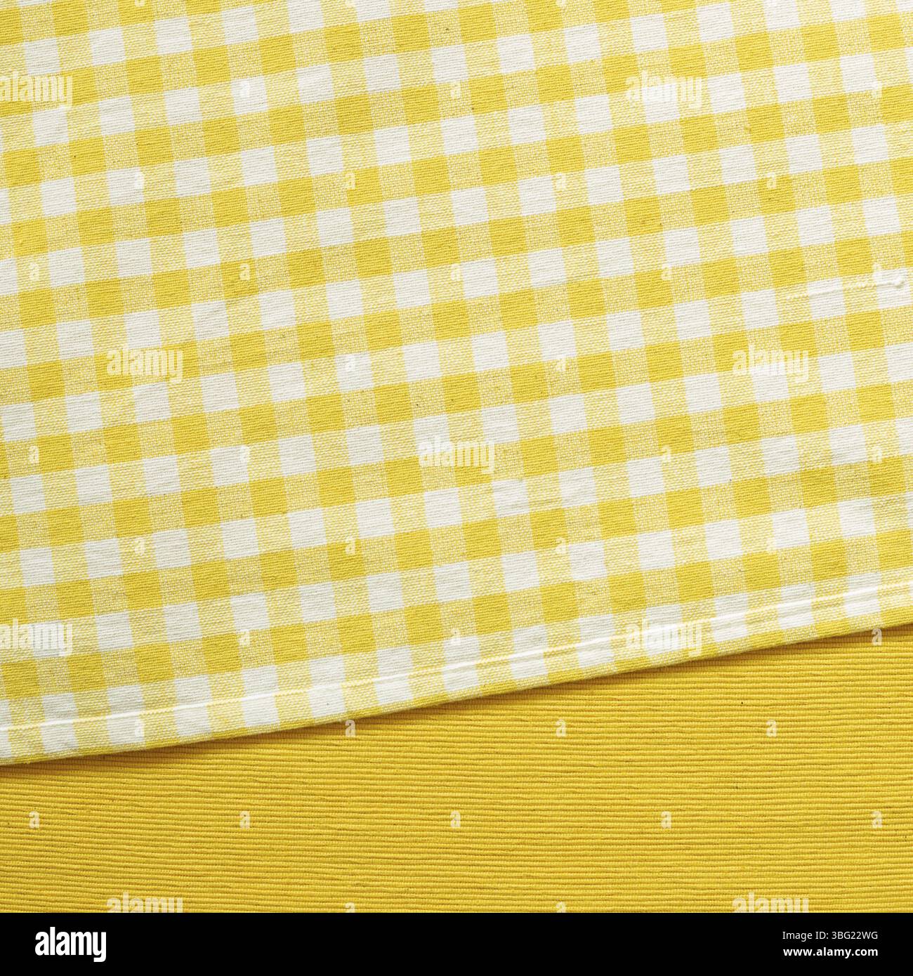 Yellow check and stripe pattern fabric background Stock Photo