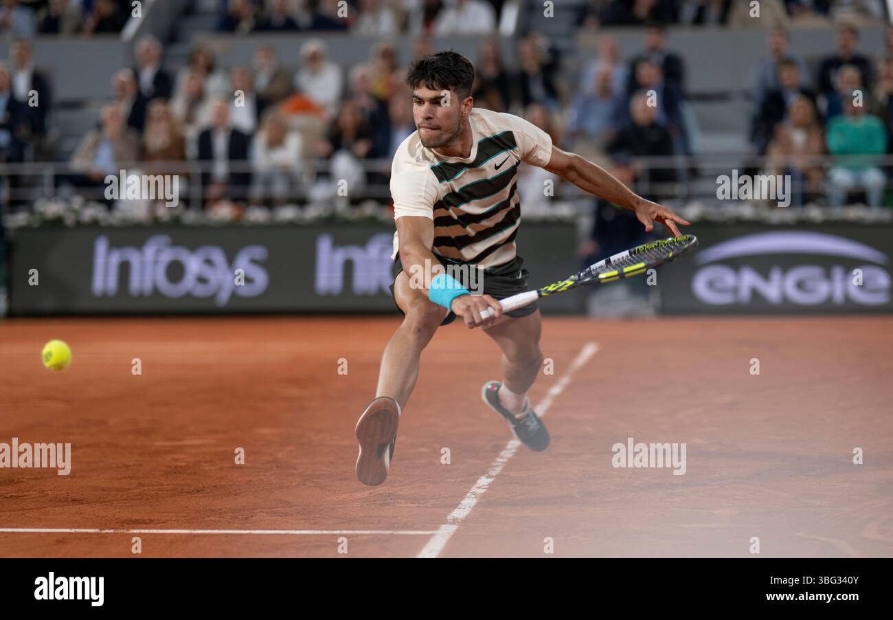 Carlos Alcaraz in action during his men's singles quarter final match