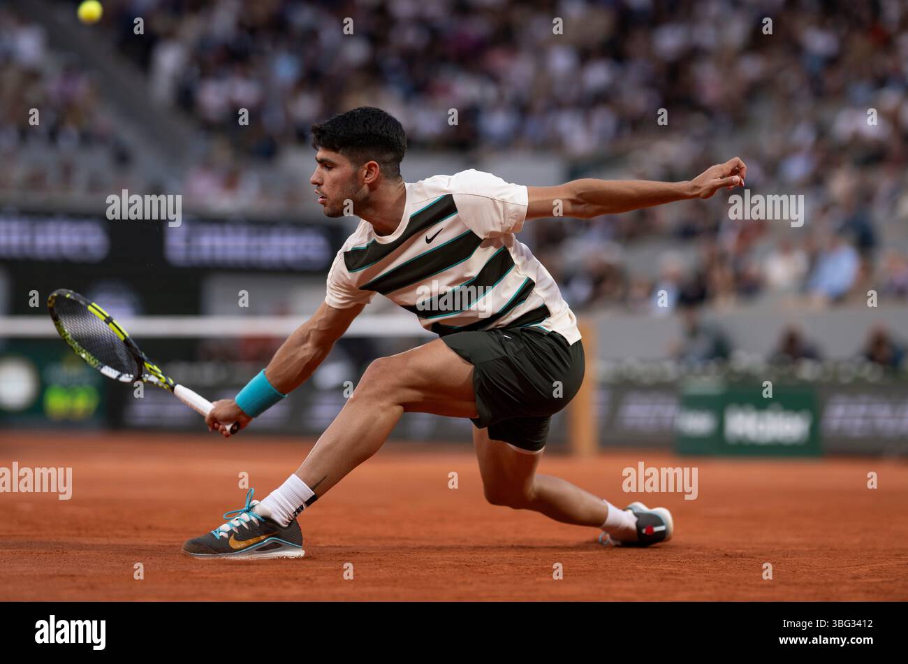 Carlos Alcaraz in action during his men's singles quarter final match