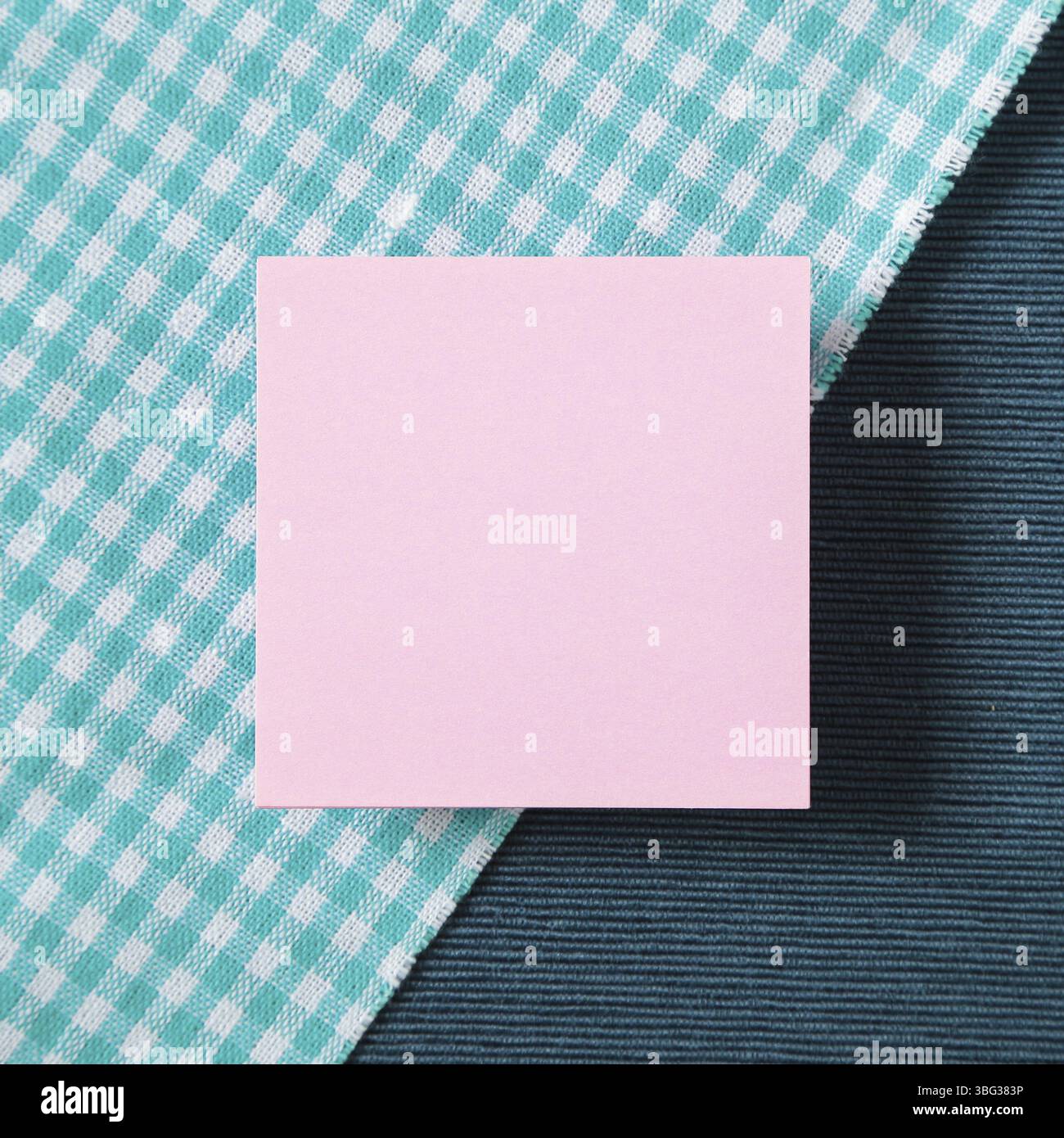 Memo paper on fabric Background Stock Photo