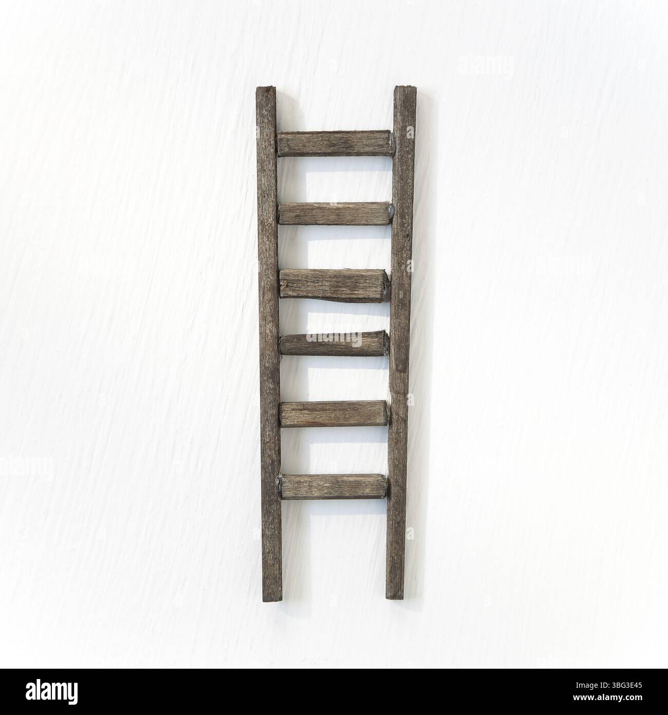 Wooden ladder isolated on white background Stock Photo