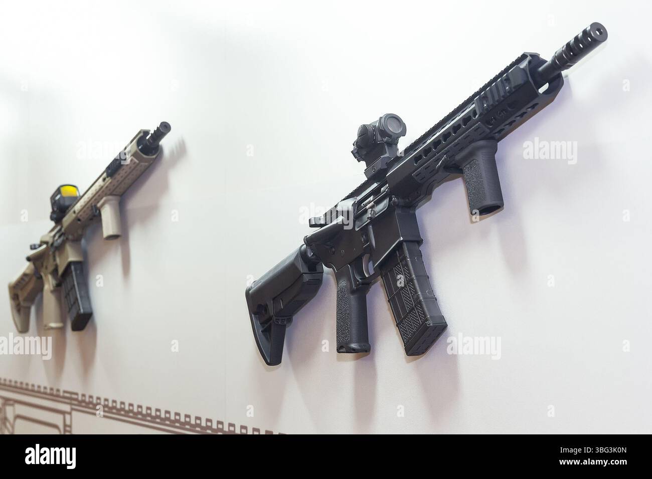 Modern automatic rifles in the weapon store. Military Stock Photo - Alamy