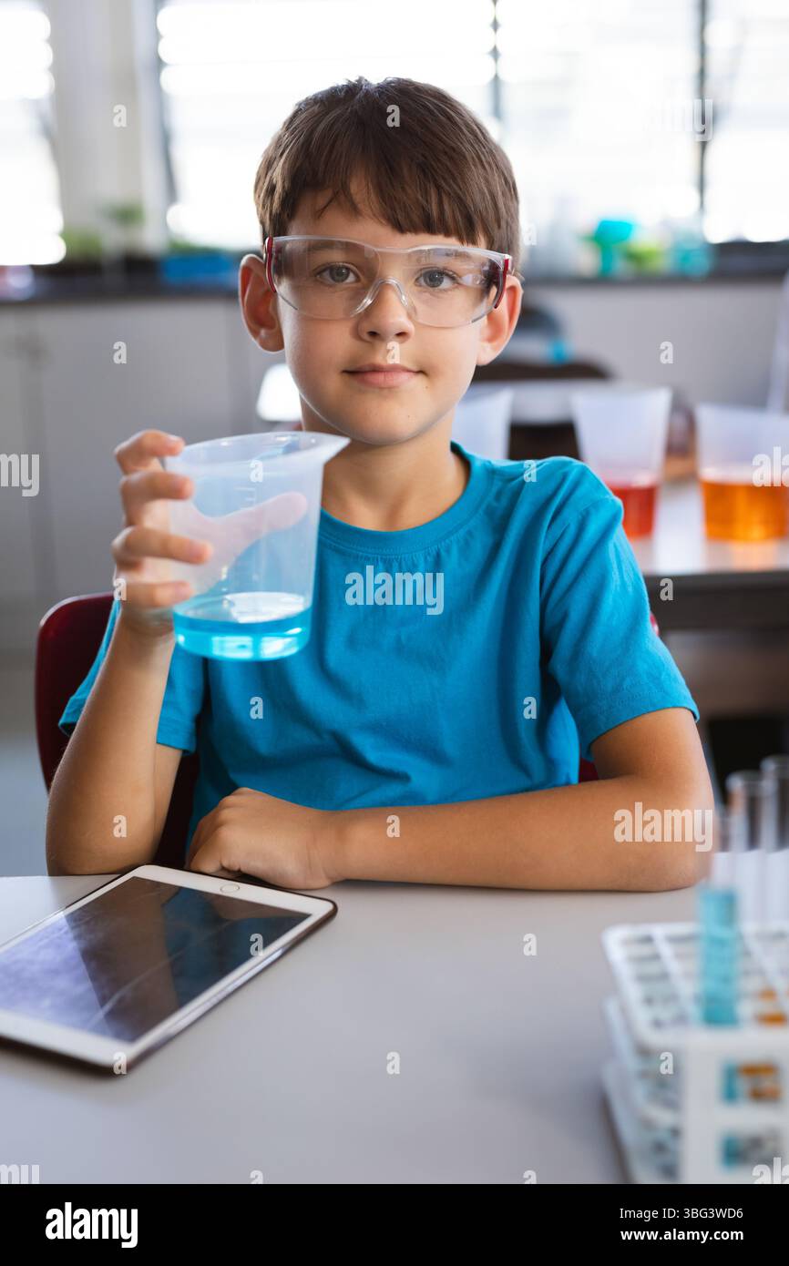 Beaker chemistry amber liquid light hi-res stock photography and images ...