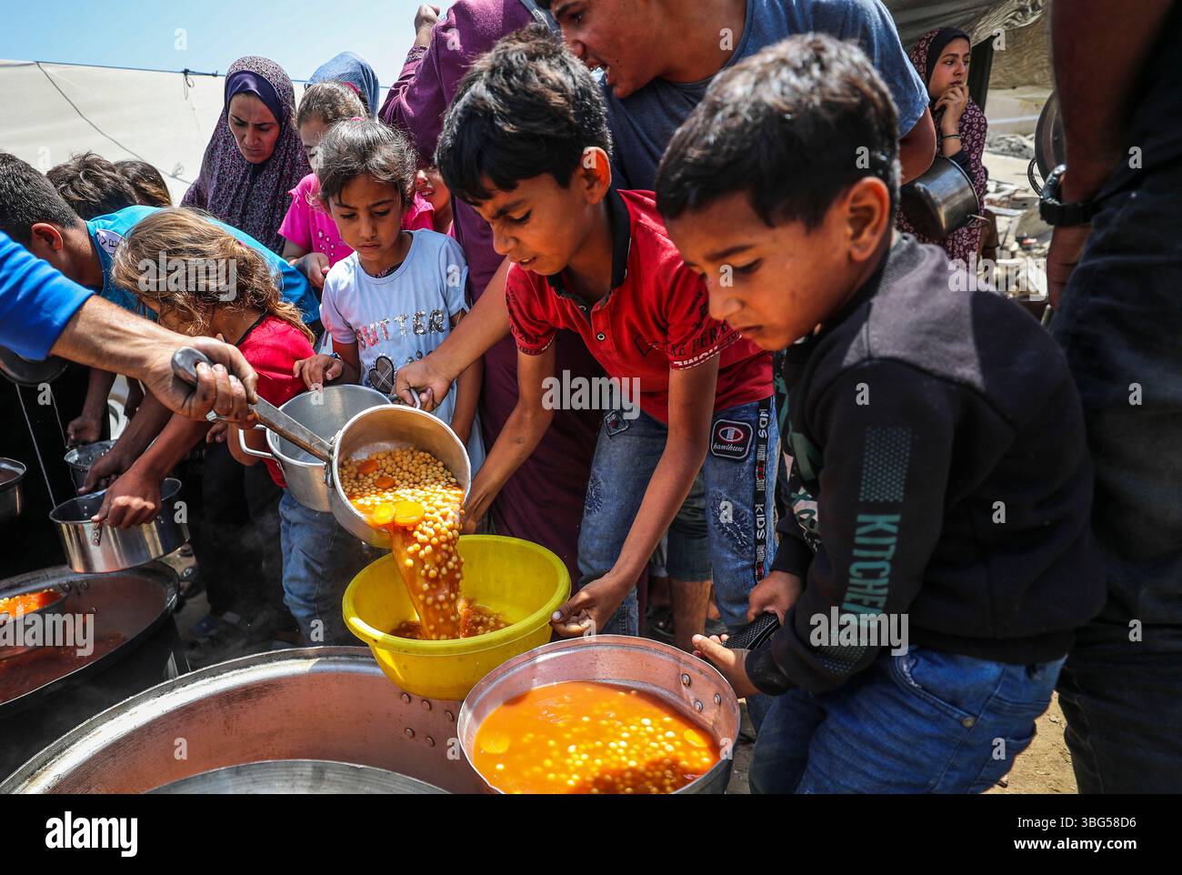 Food In Gaza Gaza. 3rd June, 2025. Palestinians receive free food at a food ...