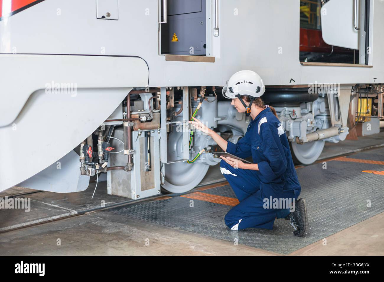 Train engineer working, Train mechanic check inspecting railway track ...
