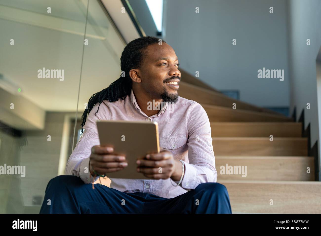 Happy software developer man working on project. Programming advanced code artificial intelligence Stock Photo
