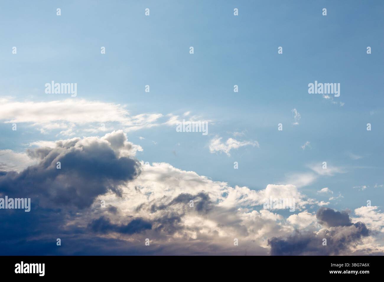 blue sky with cumulus clouds in summer. cloudy weather in the afternoon. meteorology forecast background for wind and cloudiness atmosphere conditions Stock Photo