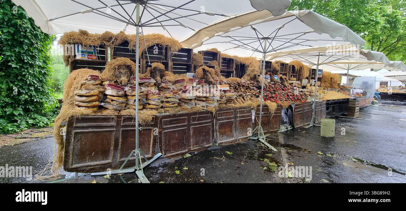 Market Amboise, France - 23.5.2025: A outdoor market stand with a lot ...