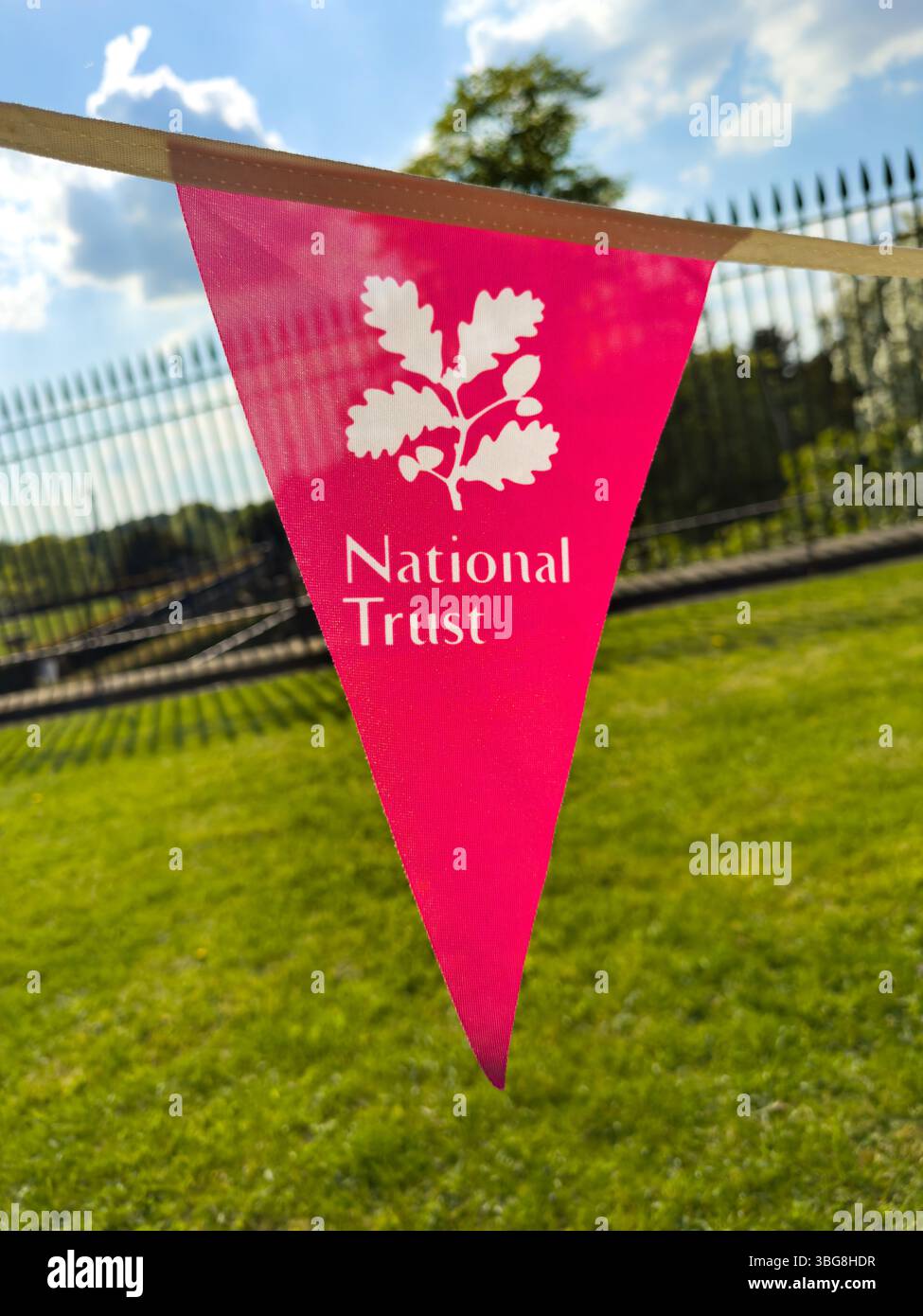 Red pennant flag bunting with National Trust logo - Smartphone Captured Stock Image