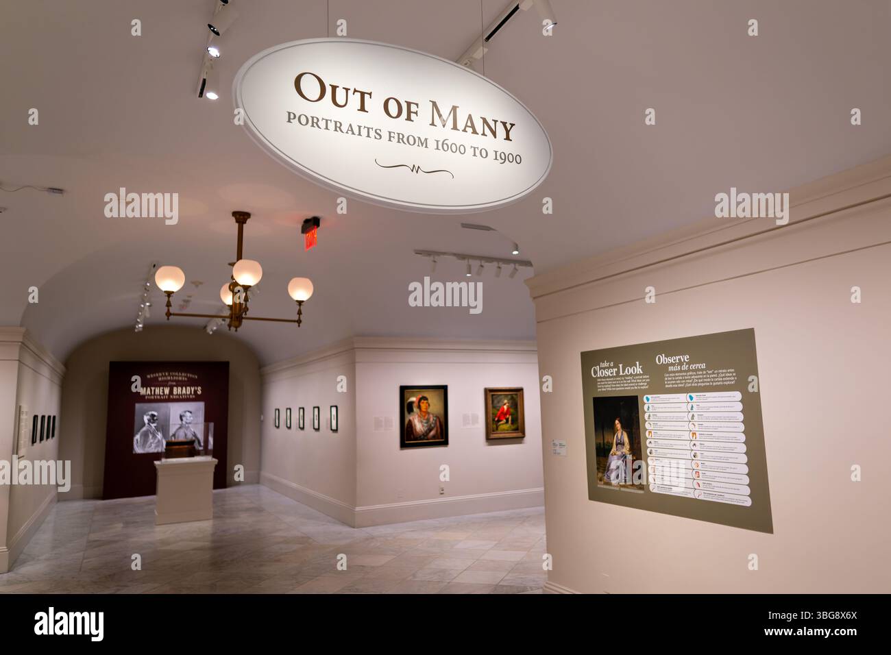 WASHINGTON DC — The 'Out of Many: Portraits from 1600 to 1900' exhibition wing at the Smithsonian American Art Museum showcases the diverse portraiture traditions that developed in the United States over three centuries. This permanent collection features works that reflect America's multicultural heritage and evolving national identity. The exhibition includes paintings, sculptures, and other portrait media created by both well-known and lesser-known American artists. Located in the historic Patent Office Building in downtown Washington, the Smithsonian American Art Museum houses one of the w Stock Photo