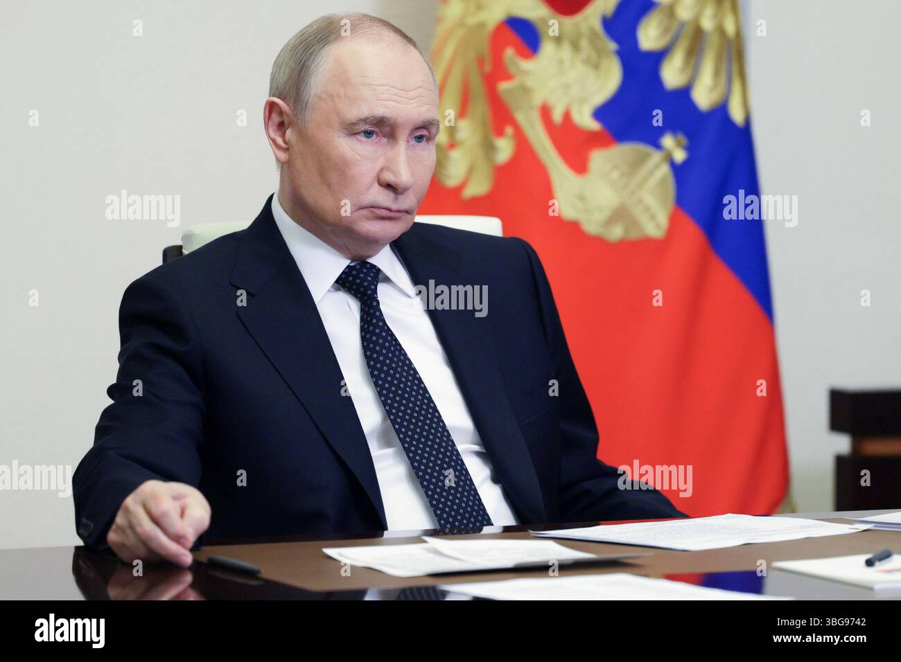 Russian President Vladimir Putin chairs a cabinet meeting via ...