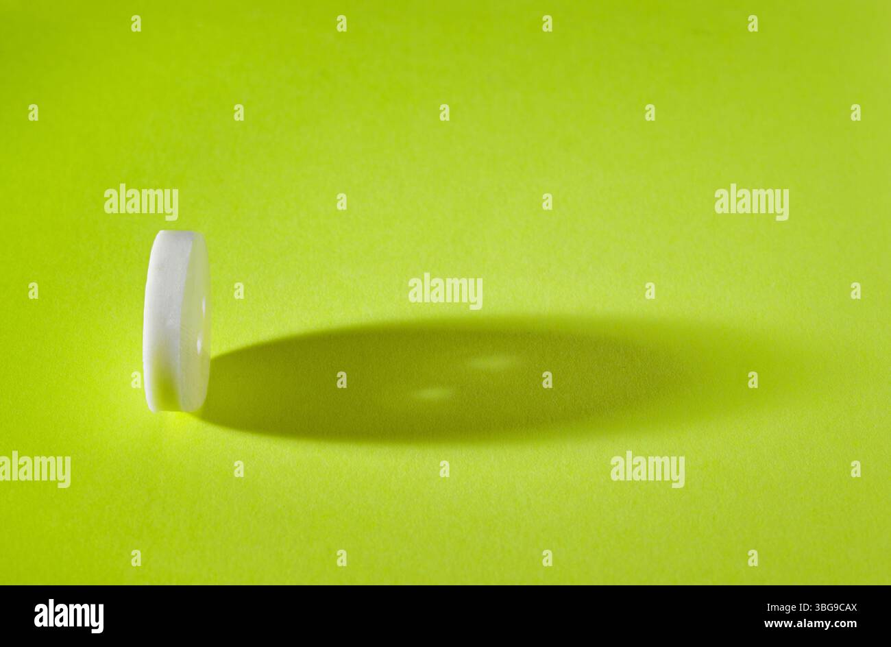 White button on yellow background , abstract minimal background Stock Photo
