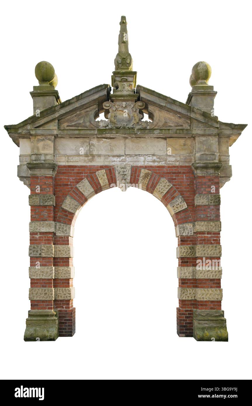 Frontal view of an archway made of sandstone elements and bricks, exposed on white Stock Photo