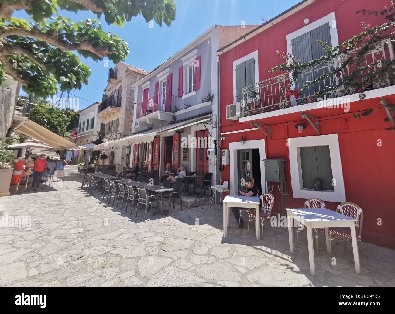Picturesque Fiscardo harbour village on the Greek island of Kefalonia. - Smartphone Captured Stock Image