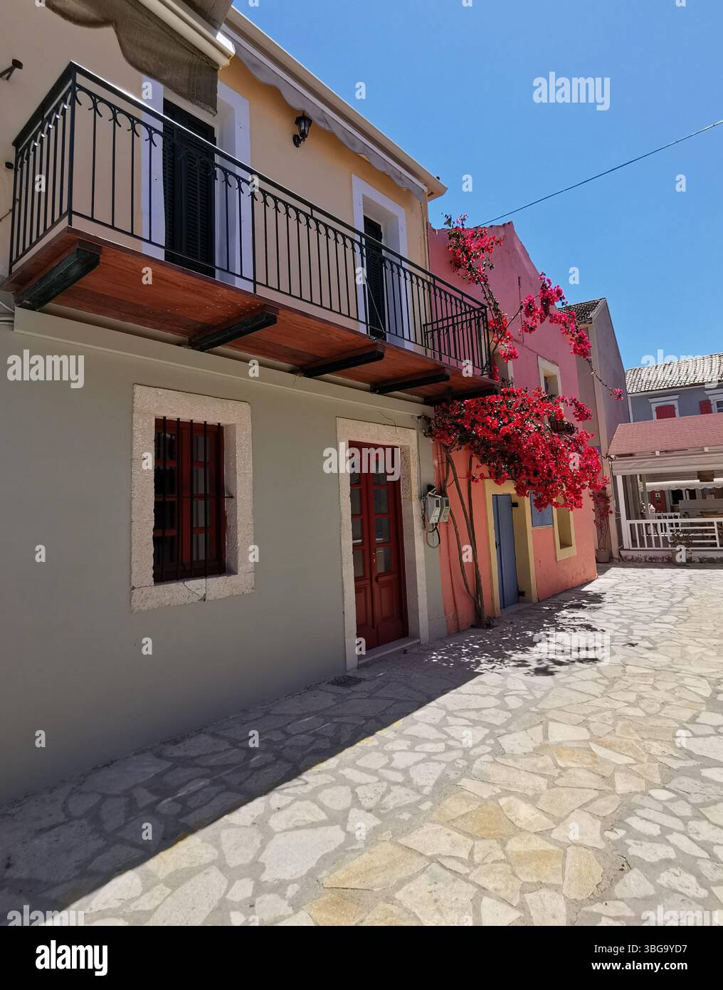 Picturesque Fiscardo harbour village on the Greek island of Kefalonia. - Smartphone Captured Stock Image