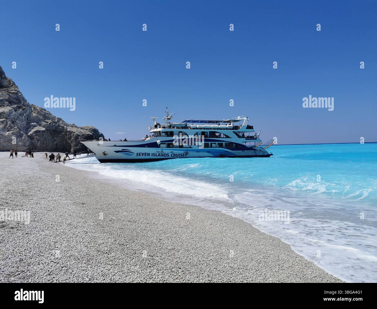 The white cliffs and turquoise waters of Egremni beach on the western side of Lefkada island in Greece. This stunning area can only be reached by boat. - Smartphone Captured Stock Image