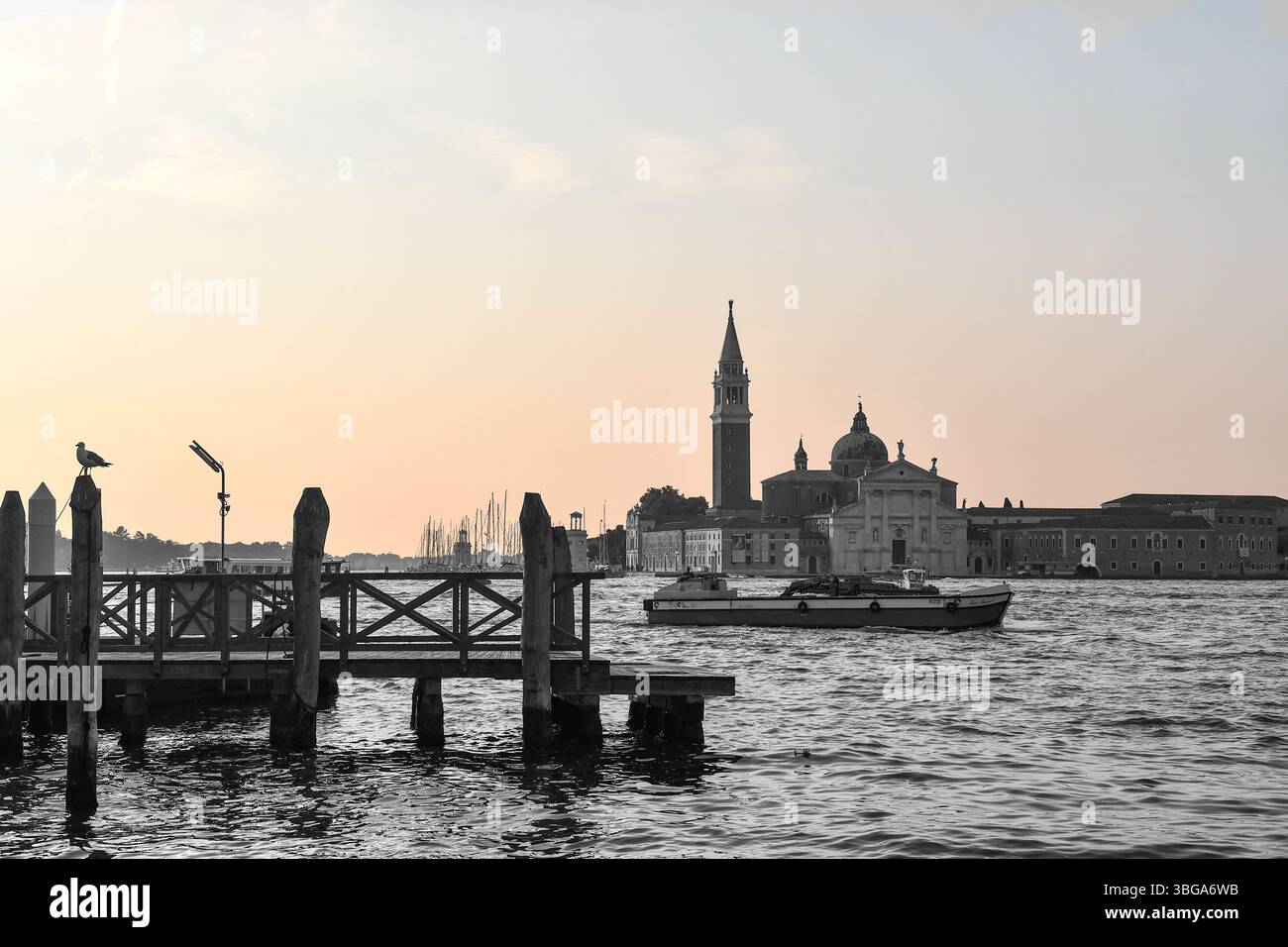Selective color. A view of the St Mark's Basin with the island of San Giorgio Maggiore in the background at dawn, Venice, Veneto, Italy Stock Photo