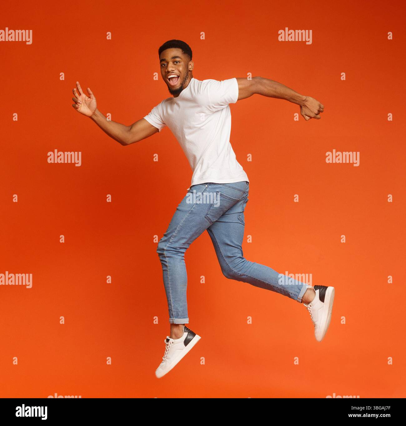 Happy black millennial man hi-res stock photography and images - Alamy