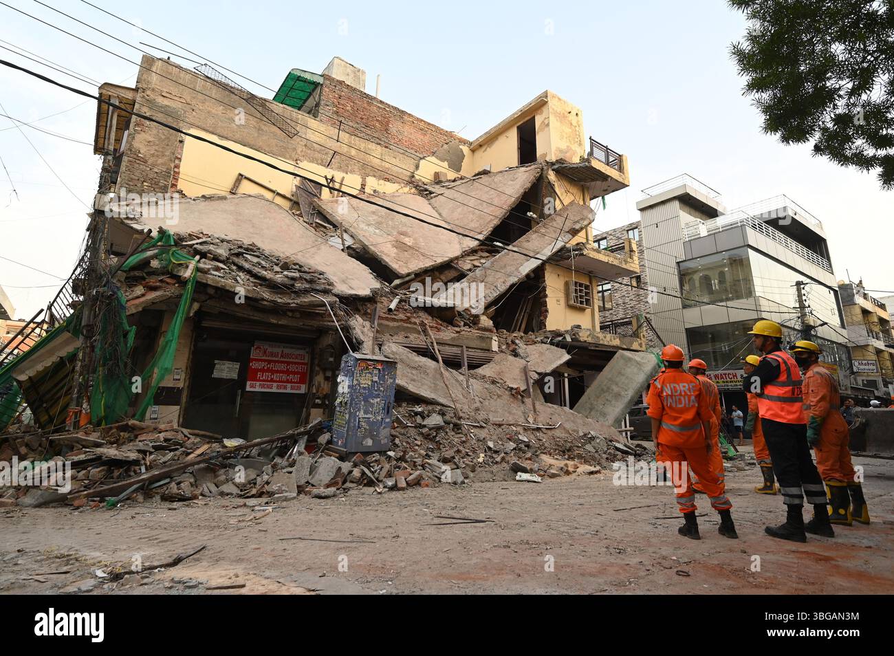 NEW DELHI, INDIA - JUNE 4: NDRF personnel inspecting the spot where a ...