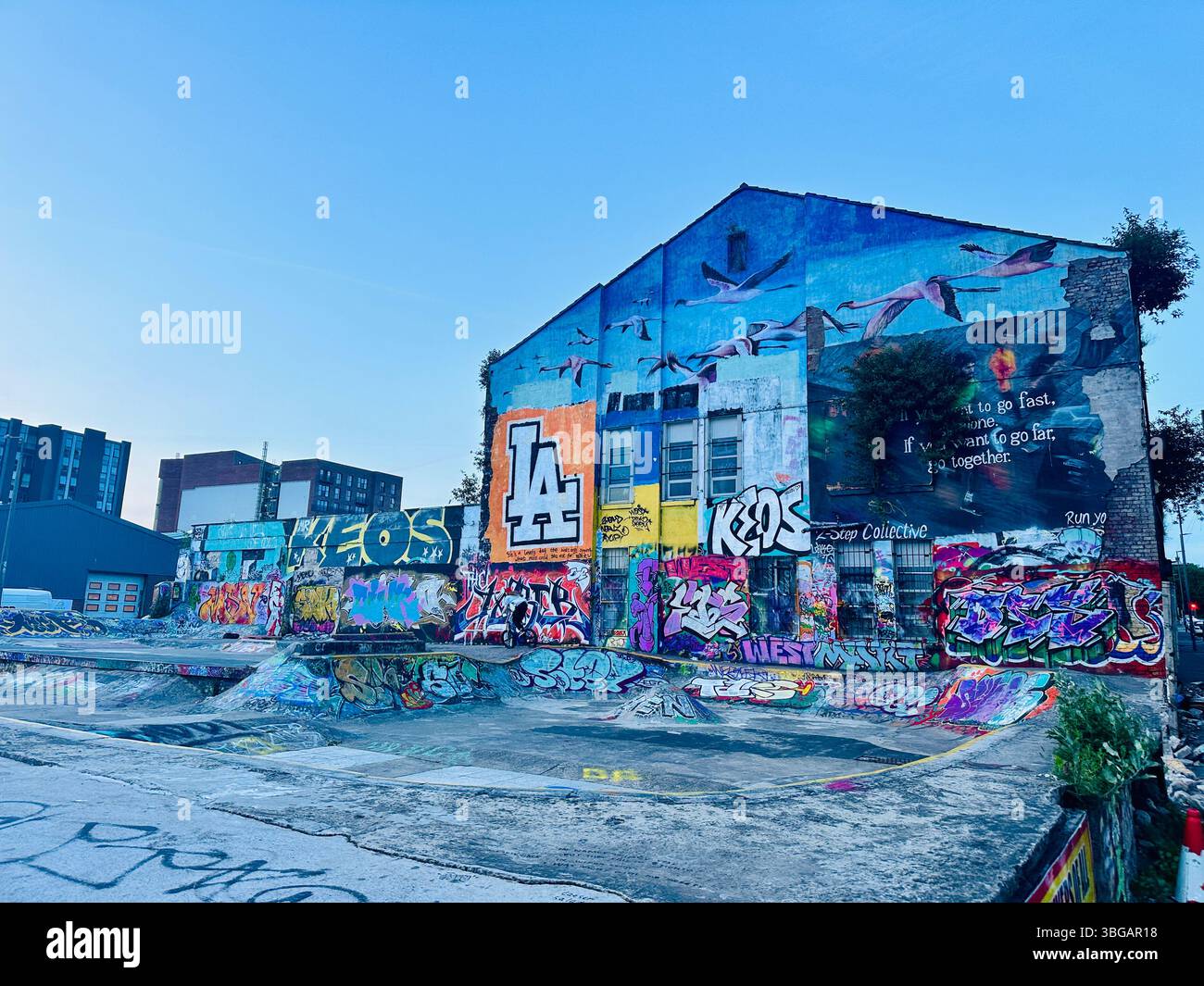 Empty colourful graffiti-covered skate park in the Baltic Triangle, Liverpool - Smartphone Captured Stock Image