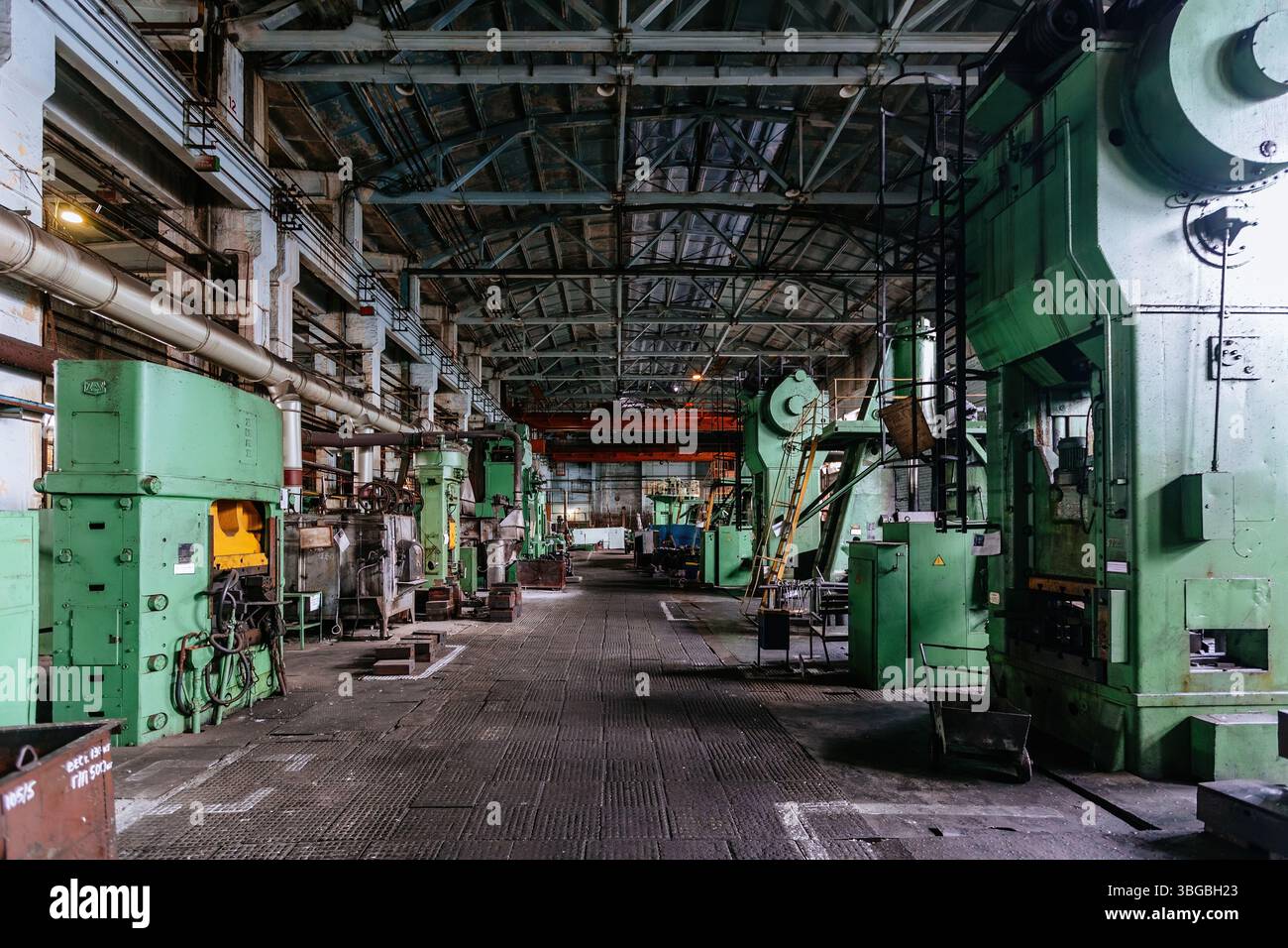 Heavy mechanical engineering factory production line. Interior of workshop. Stock Photo